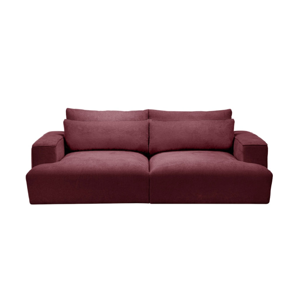 **Bequeme rote Sofa mit geraden Linien und weichen Kissen**