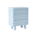 Moderne blaue Kommode mit rippengestalten Schubladen und stabilen Beinen.